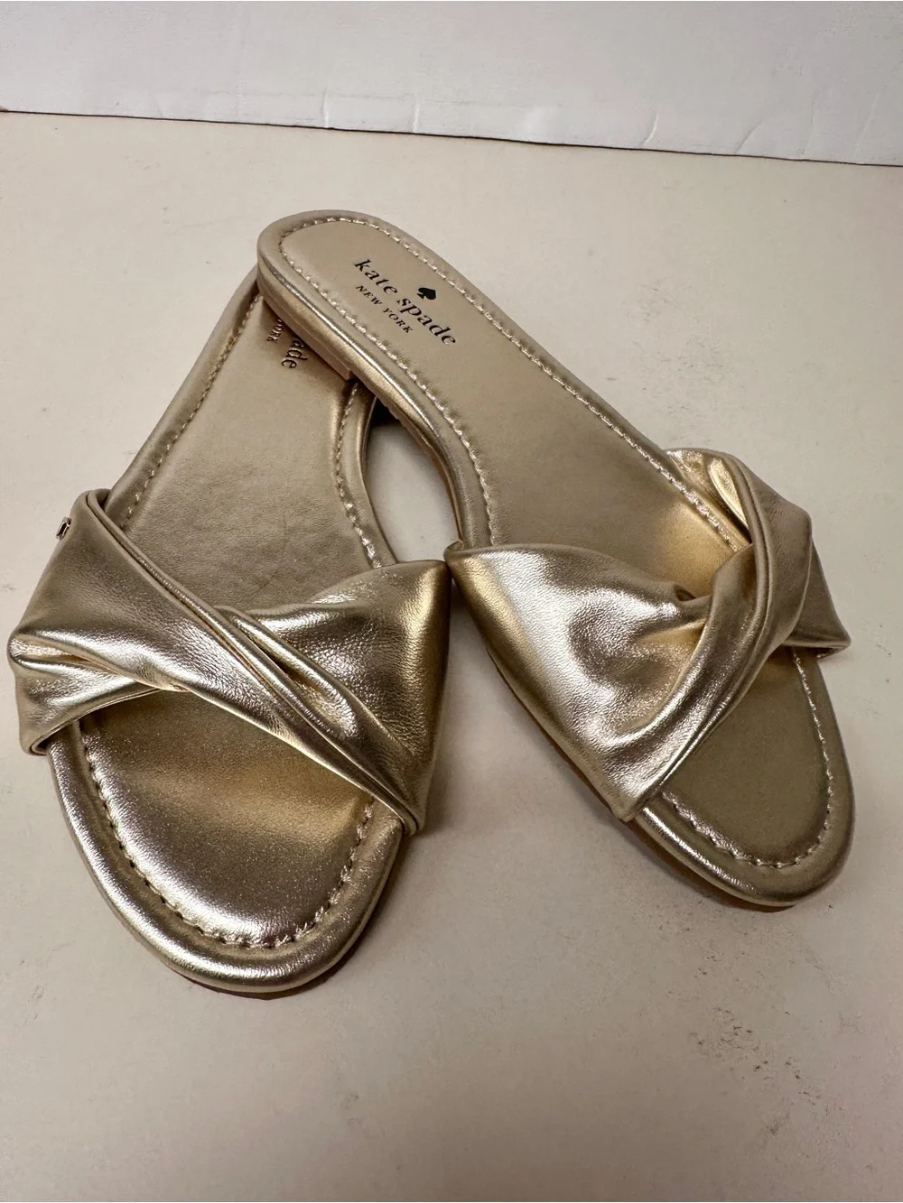 kate spade Metallic Gold Twist Slide Sandals